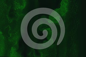 Dark Green Watercolor Texture on Black Background